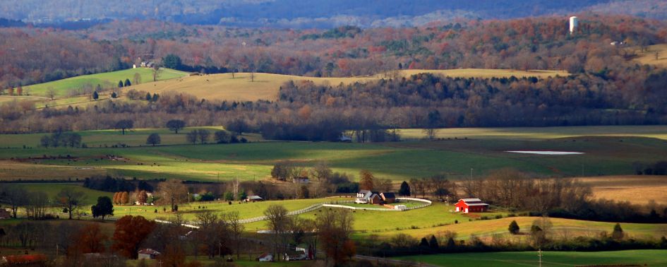 View of farmhouse in the rolling hills of Sequatchie Valley during the fall.