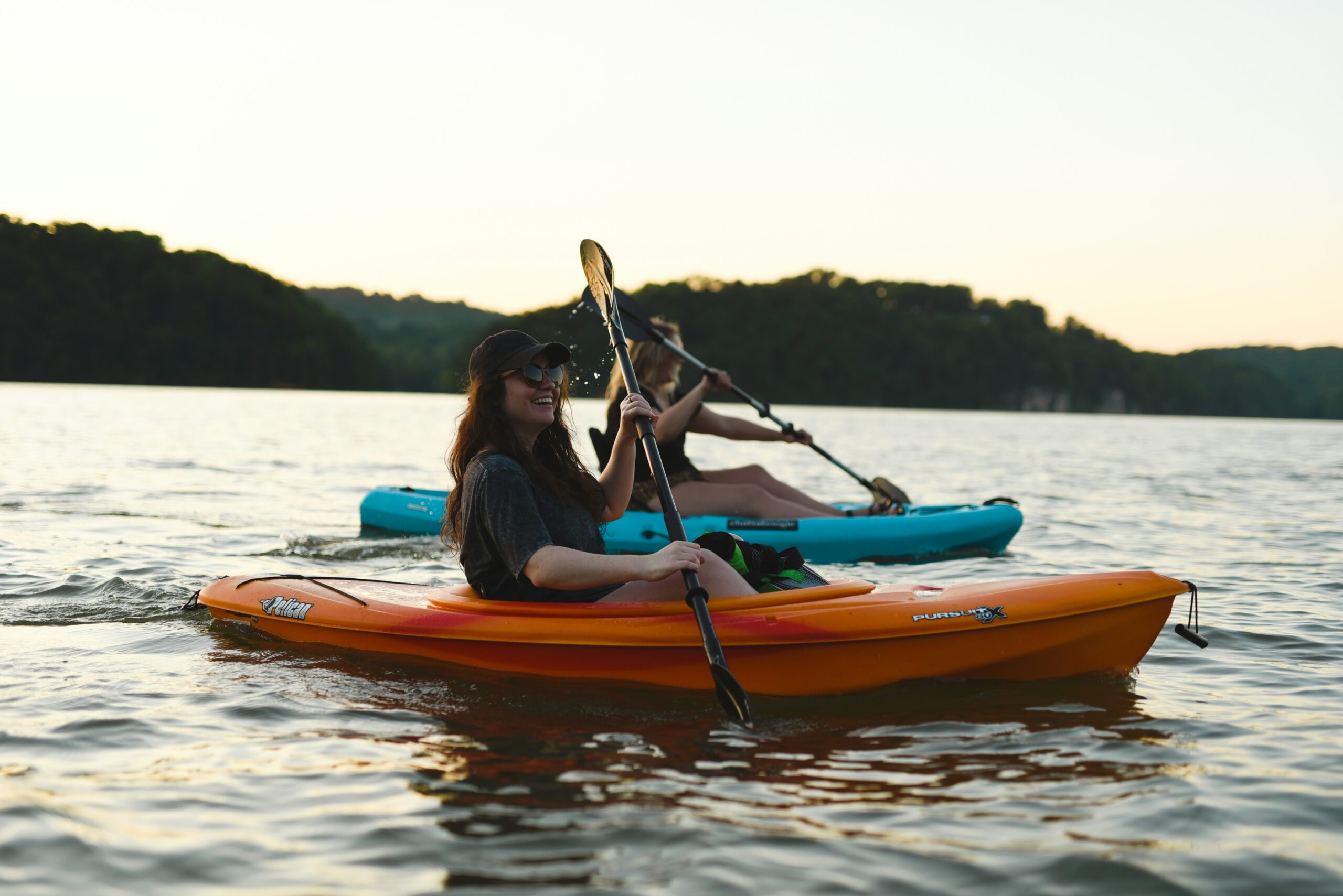 two people kayaking in Chickamauga Lake in Tennessee