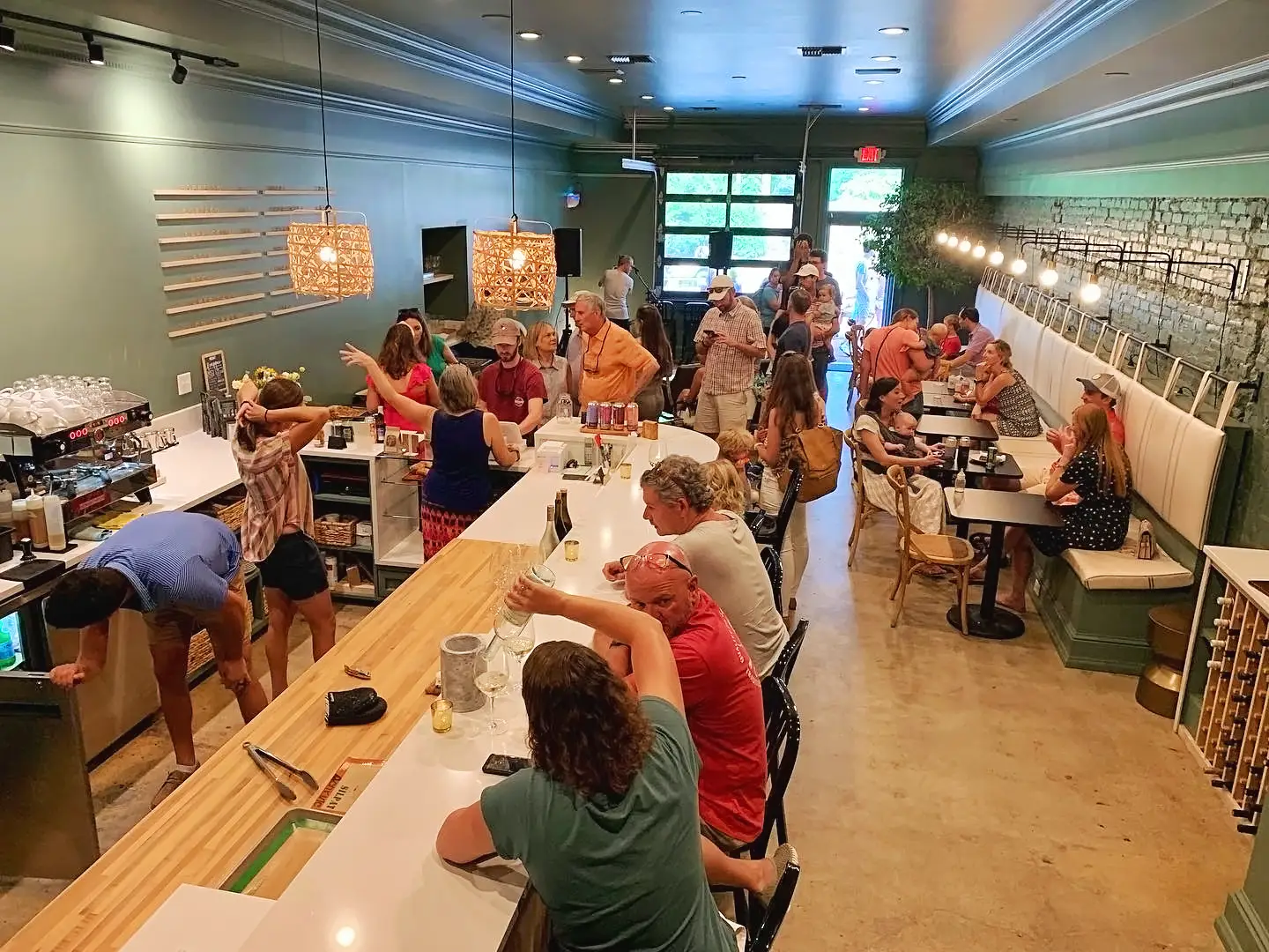 Crowd of people at Canopy Coffee and Wine Bar