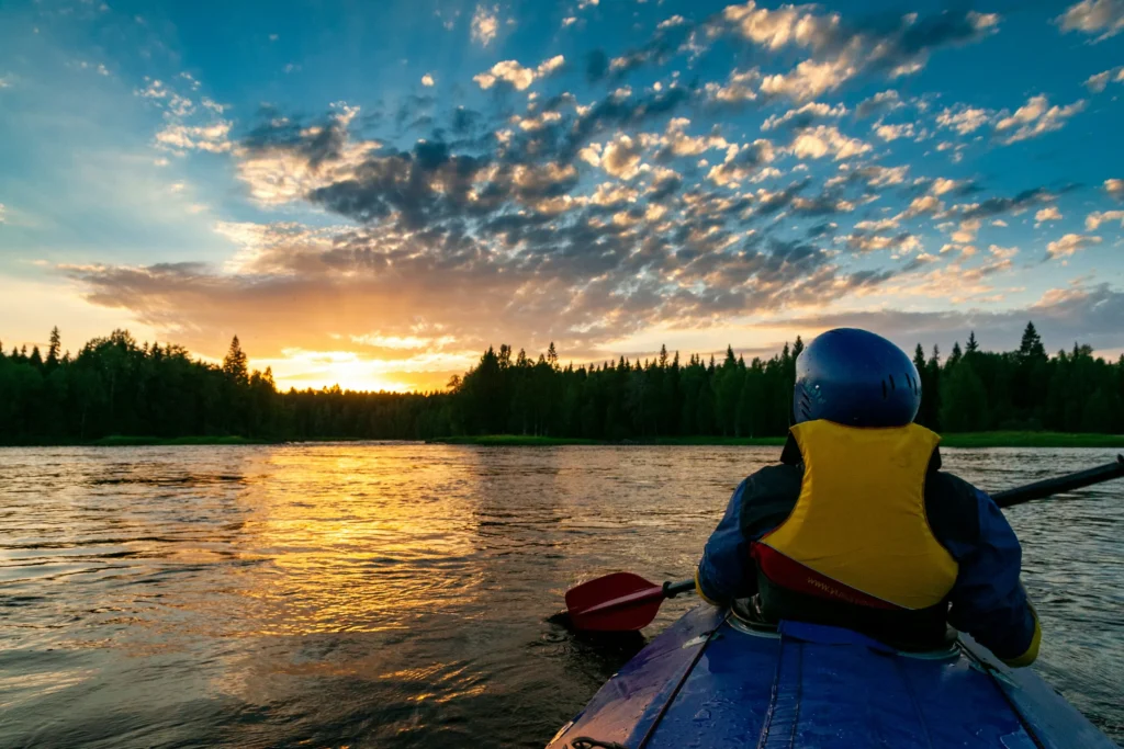 Kayaker paddling calm waters on the Ocoee River TN