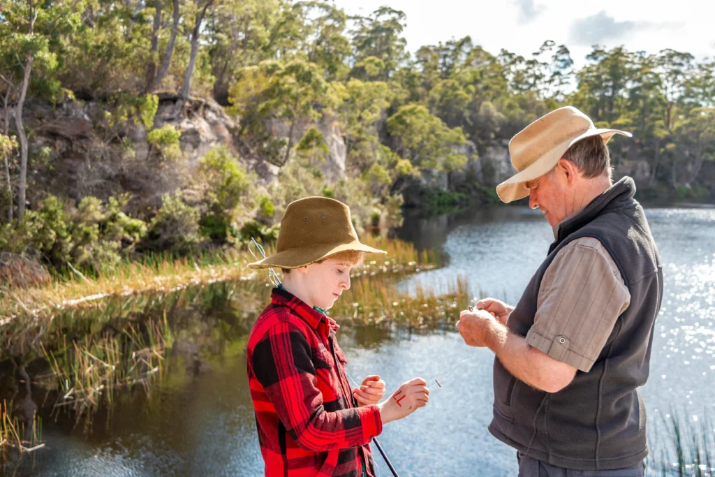 A dad and his young son getting ready to fish along the Ocoee River for Father's Day