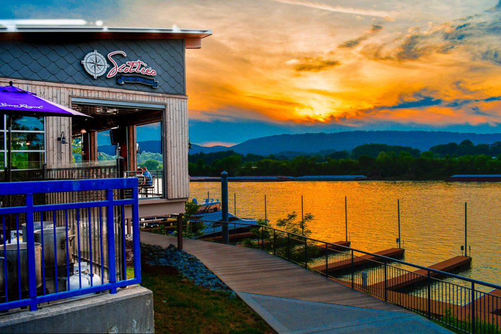 exterior of Scotties on The River at sunset