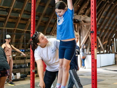 Quail Run Farm instructor helping a client
