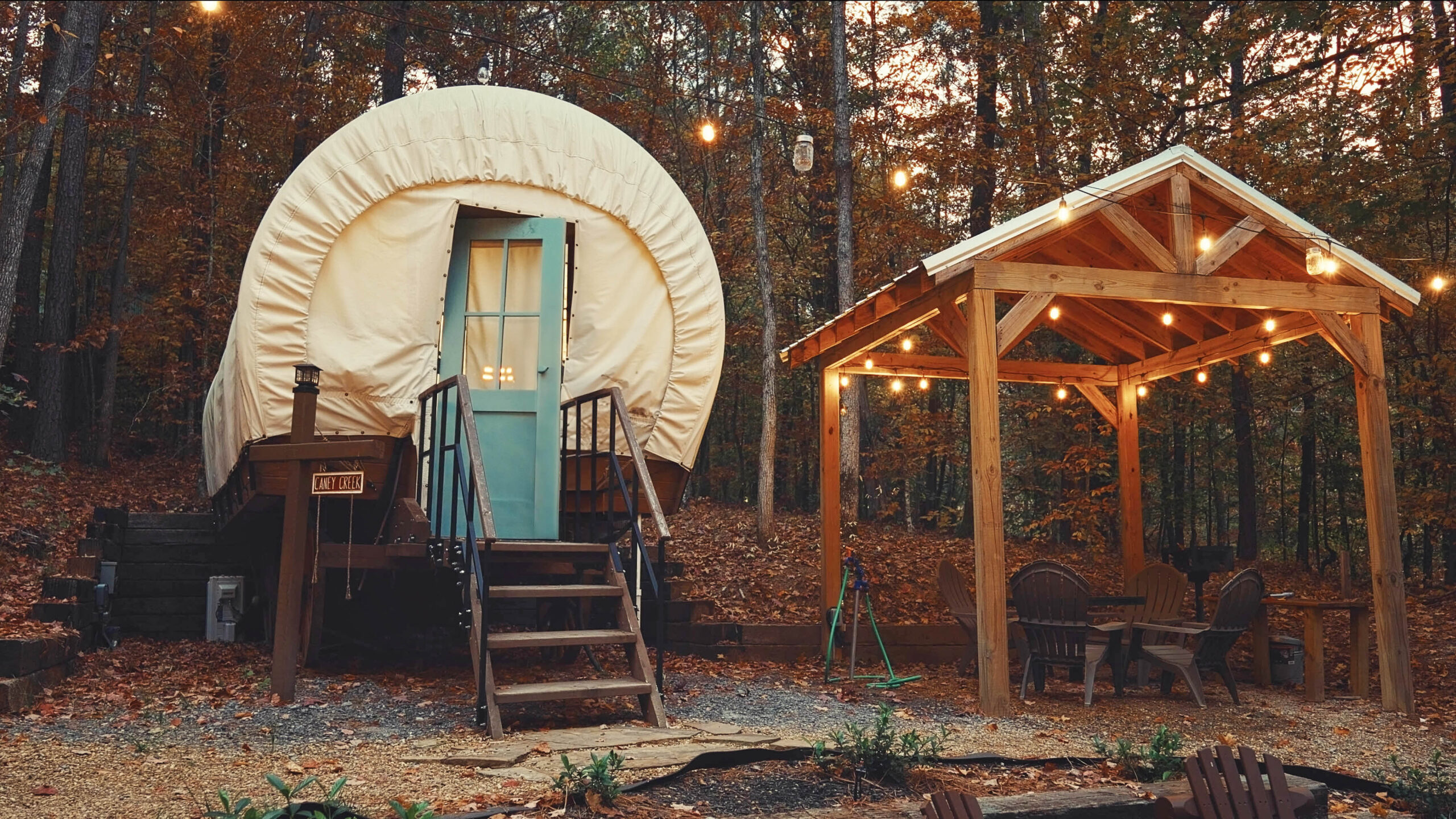 a covered glamping wagon at the Ocoee River in Welcome Valley Village