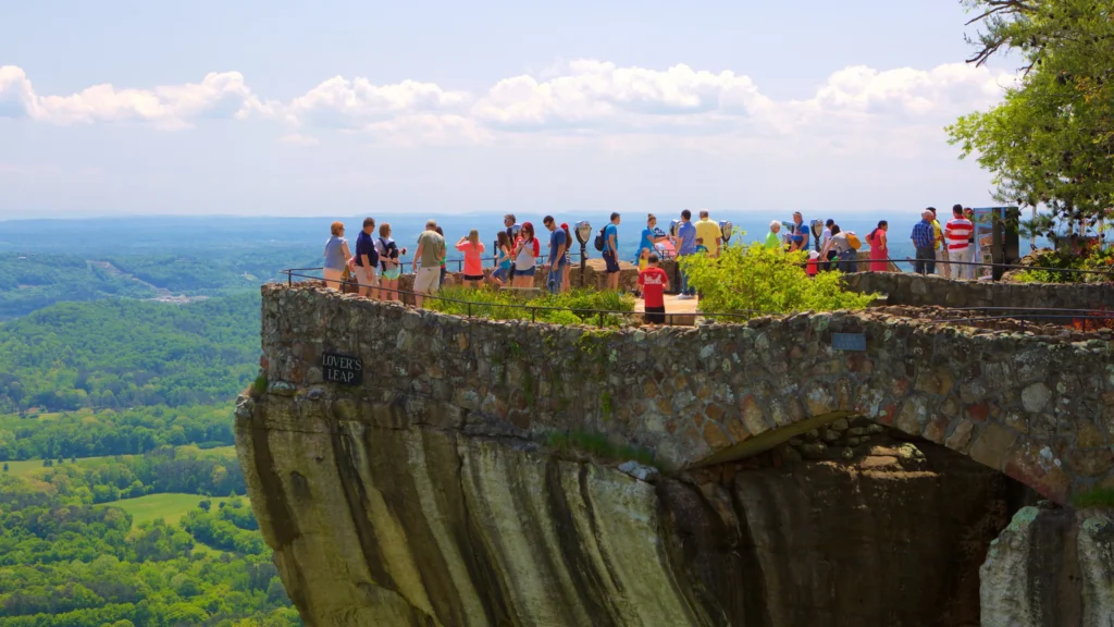 Visitors standing on Lover’s Leap overlook at Rock City, Tennessee