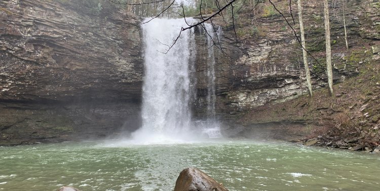 Hemlock and Cherokee Falls spilling into a shallow pool in Tennessee forest