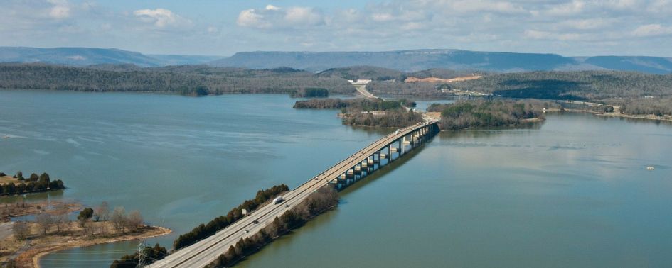 Bridge crossing Nickajack Lake surrounded by autumn foliage in Tennessee