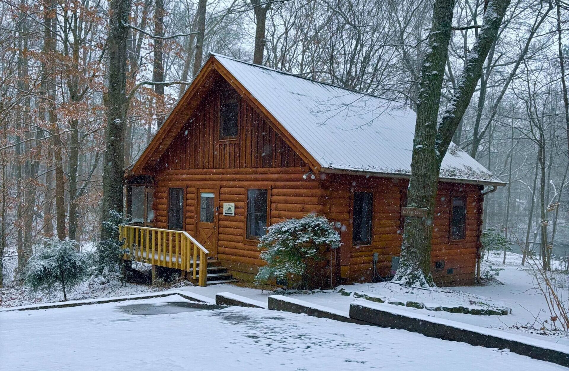 a cabin at Welcome Valley Village in the winter