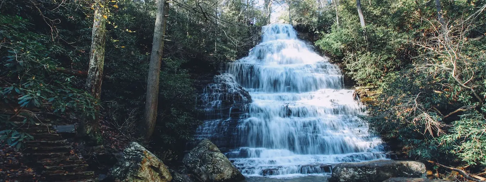 Tiered waterfall surrounded by forest near the Ocoee River