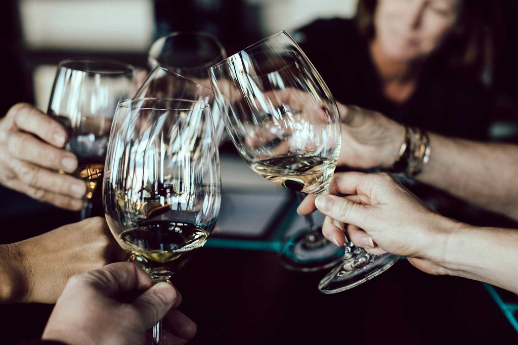 people clinking glasses on Tennessee Wine Train
