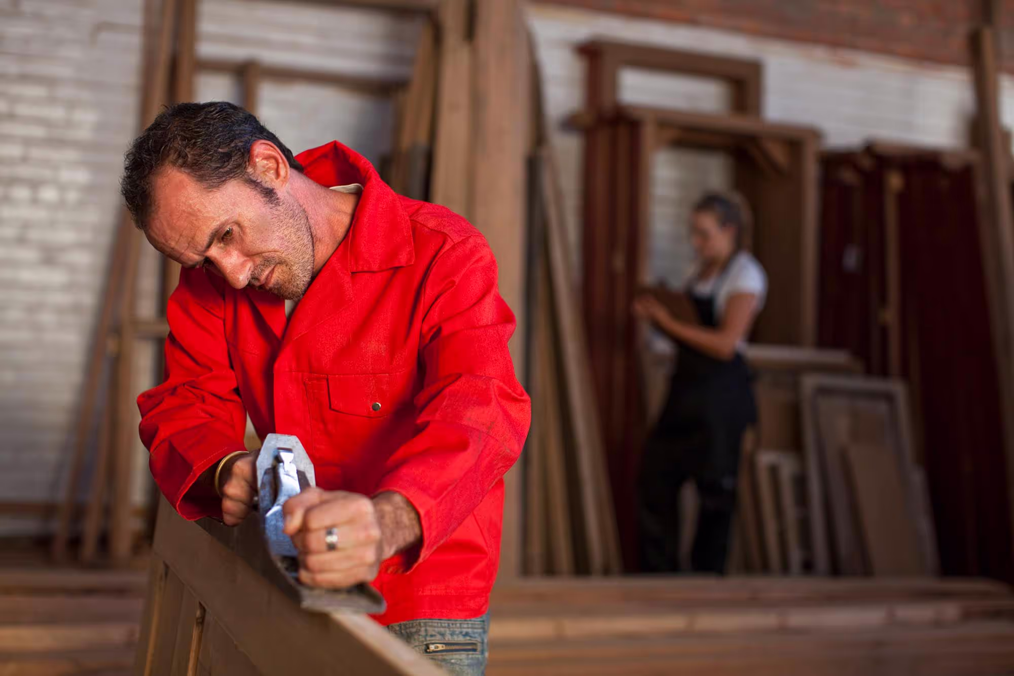carpenter using plane 1