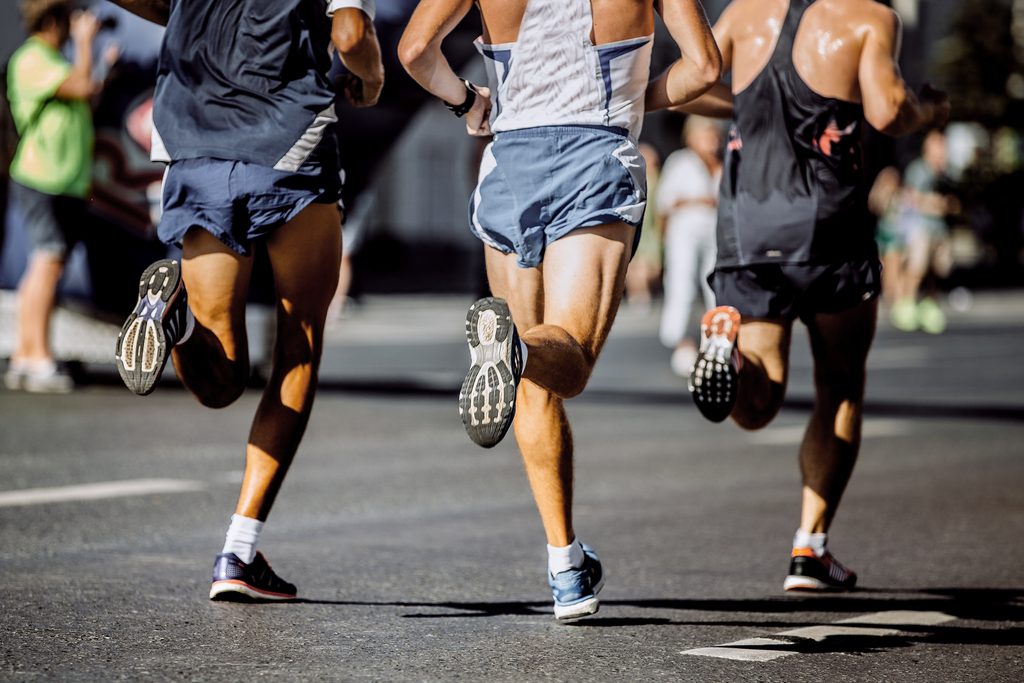 legs male runners marathon runners racing in an urban environment 2026 01 07 23 52 45 utc
